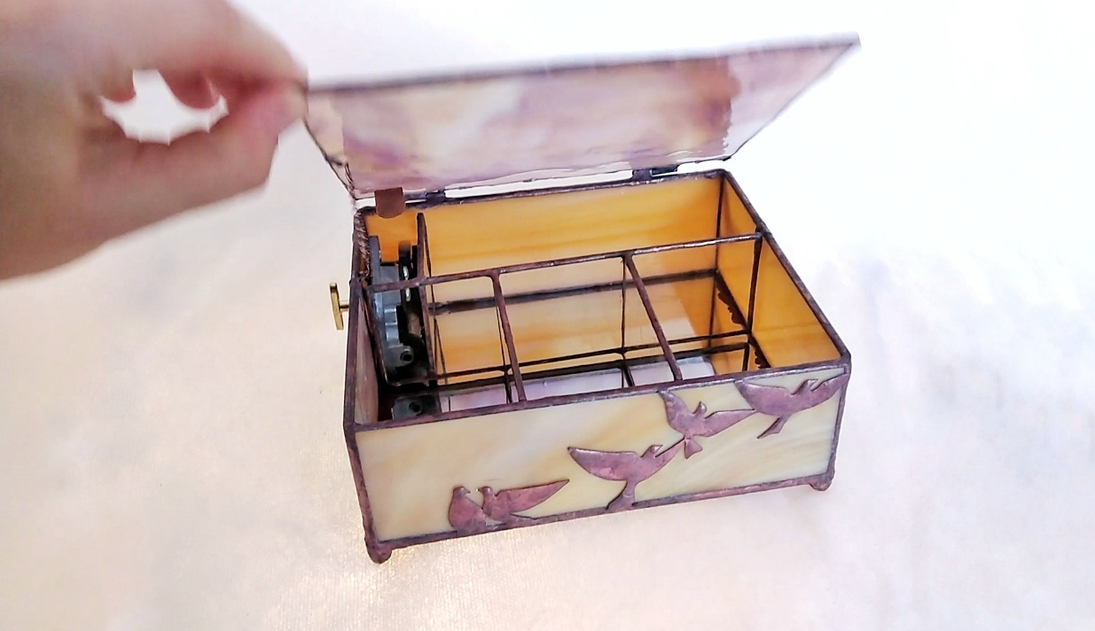 Glass music box with birds